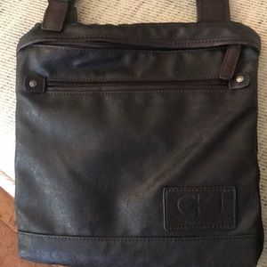 Calvin Klein cross body purse. Never used.